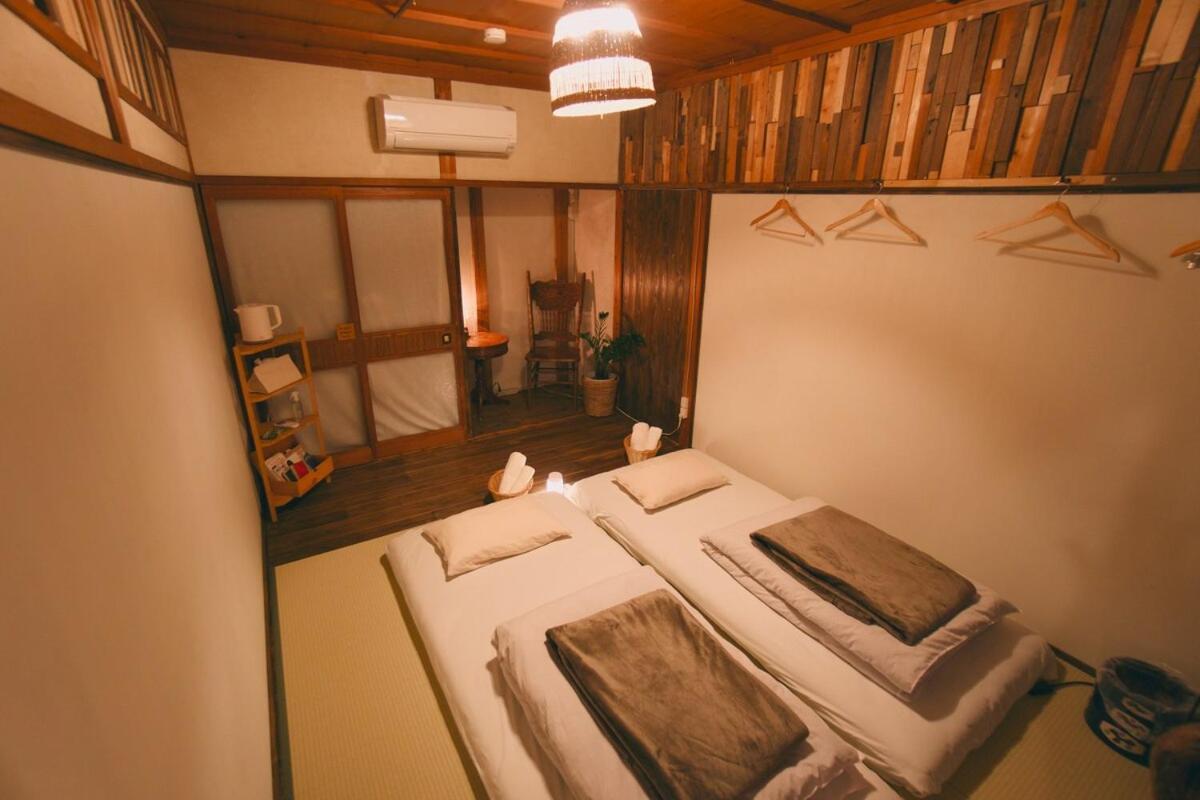宿たぬきのねどこ Guesthouse Tanuki Tokoname Buitenkant foto